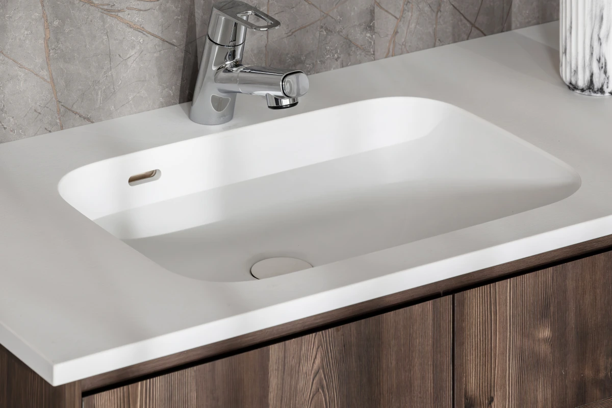 Chậu âm bàn UR3854 gắn liền khối với mặt đá, mép chậu liền mặt đá không có đường silicon